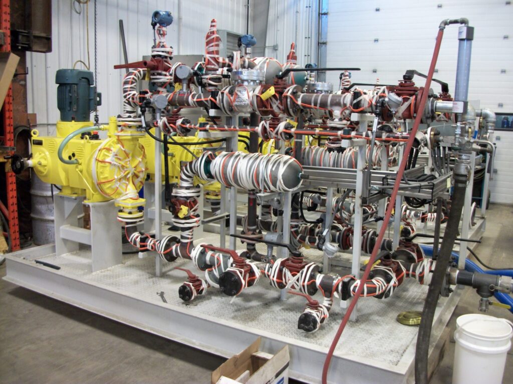 15i. metering pumps - Caustic pkg w heat trace